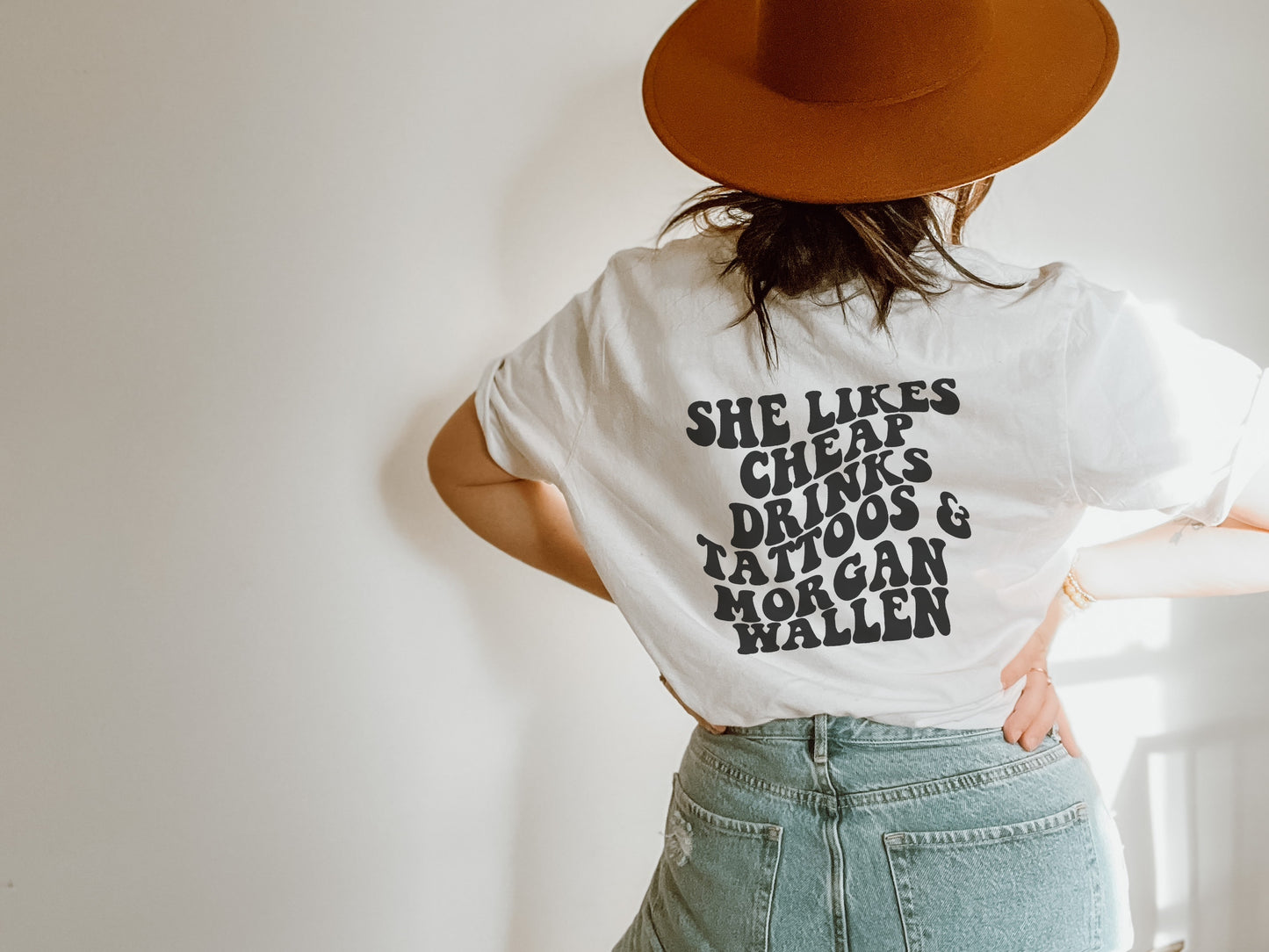 She Likes Cheap Drinks and Tattoos Unisex Tee